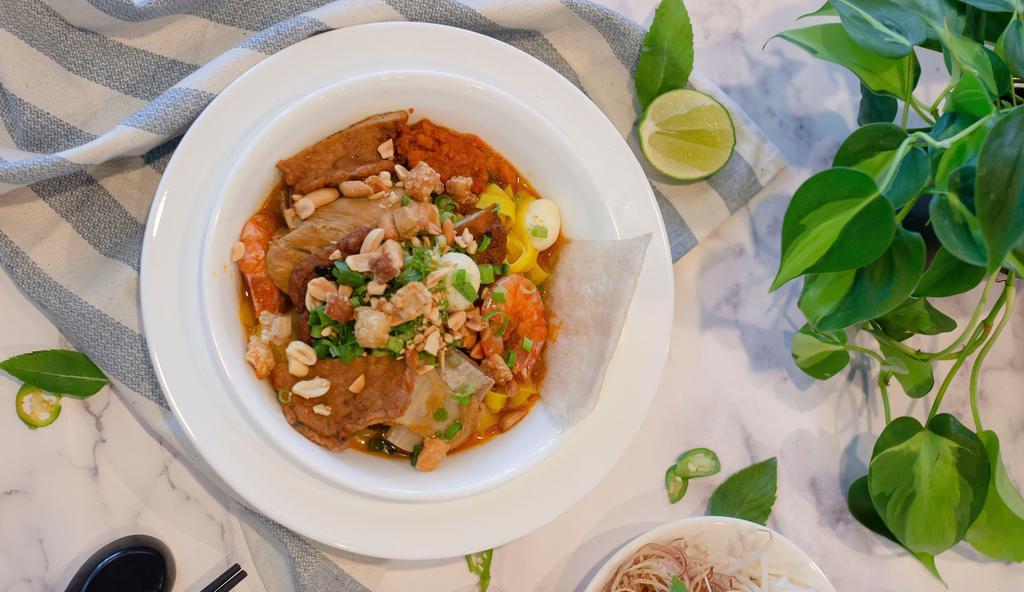 Quang Noodle (MÌ QUẢNG NAM GIAO) · Noodle with fresh shrimp, pork, fish cake and pork ribs.