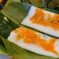 Flat rice dumpling (BÁNH NẬM) · Flat rice dumpling in banana leaves