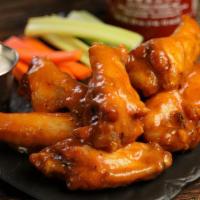 Traditional Sriracha Mango · 8 traditional wings tossed in Sriracha mango (medium heat), served with carrots & celery and...