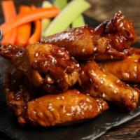 Korean Bbq · 8 traditional wings tossed in Korean BBQ (mild heat), served with carrots & celery and a dip...
