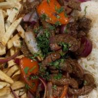 Family Lomo Saltado · Serves 3 to 4. Wok fried tenderloin steak strips onion, tomato, cilantro, soy balsamic sauce...