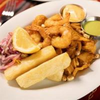 Jalea de Mariscos · Fried calamari, shrimp, fish, served with fried yucca, huacatay, and rocoto aioli, cancha y ...