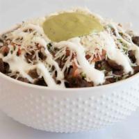 Burrito Bowl · Choice of meat, rice, beans, onion, chopped tomatoes cilantro, cheese, sour cream, and salsa.