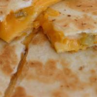 Cheese Quesadilla · Melted cheese, lettuce, and tomatoes.