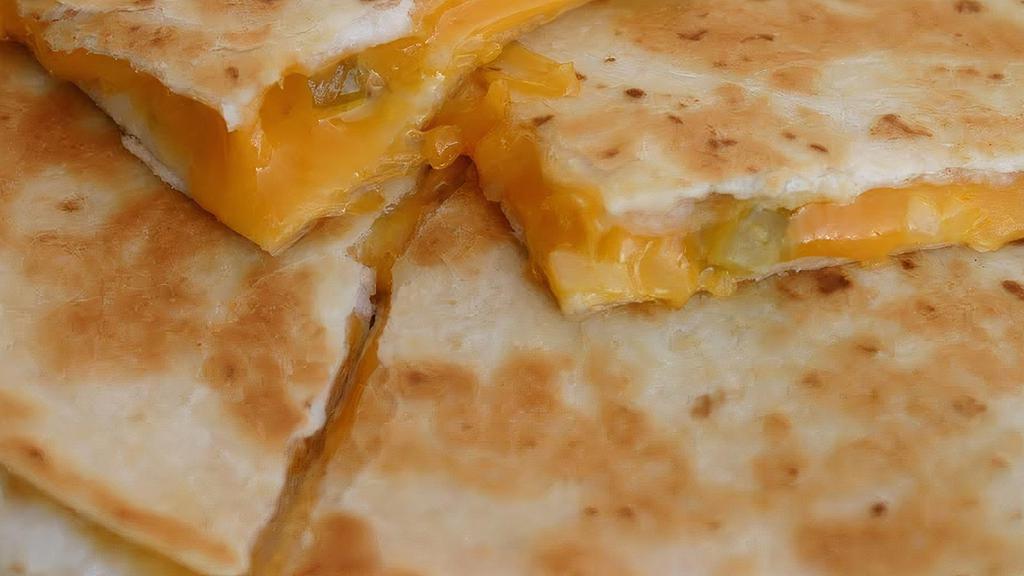 Cheese Quesadilla · Melted cheese, lettuce, and tomatoes.