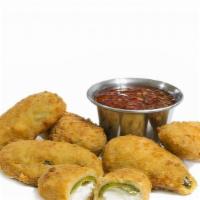 Jalapeño Poppers · Spicy poppers served with marinara sauce.
