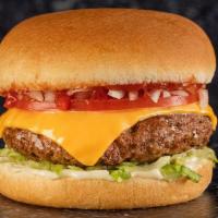 Classic Cheeseburger · Beef patty with American cheese, tomato, lettuce, diced white onion, ketchup & mayo on a sof...
