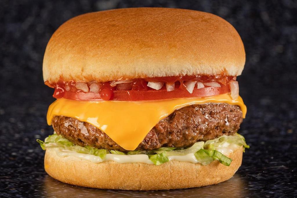 Classic Cheeseburger · Beef patty with American cheese, tomato, lettuce, diced onion, ketchup & mayo on a soft bun.