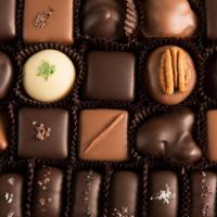 20 Piece Assorted Chocolates · Smooth, luscious truffles and butter cremes, chocolate drenched almonds, cashews, pecans and...