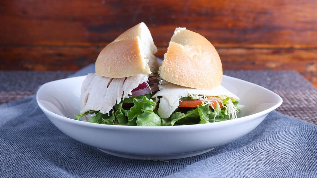 Oven Roasted Turkey Breast · Includes lettuce, mayonnaise, gourmet mustard, tomato, cucumber, red onion, sprouts, salt, pepper, and pickle.