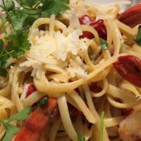 Scampi di Gamberetti · linguini, wild shrimp, calabrian chili, roasted garlic, parmigiano, parsley and white wine