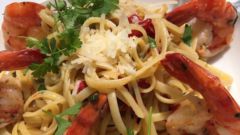 Scampi di Gamberetti · linguini, wild shrimp, calabrian chili, roasted garlic, parmigiano, parsley and white wine