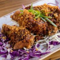 Spicy Chicken Wings · Gluten Free. Tossed in sweet and tart balachung sauce.