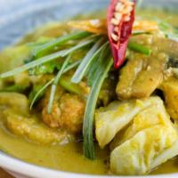 Coconut Veggie Curry · Gluten Free. Vegan. With bay leaves, cabbage, bok choy, mushrooms and marble potatoes.