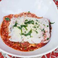 Lasagna · pomodoro sauce with a savory combination of ricotta, italian sausage, mozzarella, parmigiano...