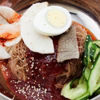 Bibim Naengmyeon 비빔냉면 · Buckwheat noodle served in house-made spicy sauce with radish, cucumber, brisket and boiled ...
