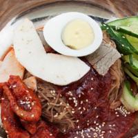 Hwe Naengmyeon 회냉면 · Buckwheat noodle served in house-made spicy sauce with radish, cucumber, boiled egg and mari...