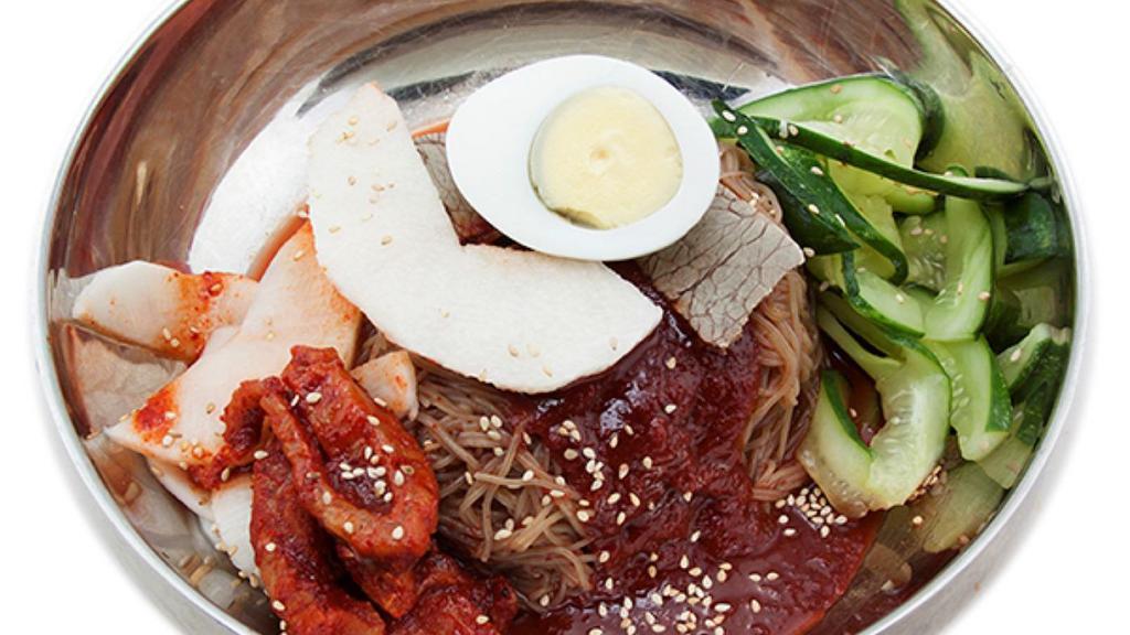 Hwe Naengmyeon 회냉면 · Buckwheat noodle served in house-made spicy sauce with radish, cucumber, boiled egg and marinated fish