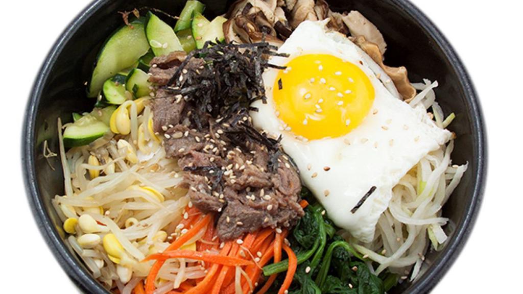 Hotstone Bibimbap 돌솥비빔밥 · In Hotstone - Rice topped with beef, assorted vegetables, and egg. (Rice, kimchi, radish kimchi and special house sauce included )