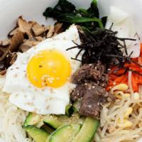 Bibimbap · Rice topped with beef, assorted vegetables,  and egg. (Rice, kimchi, radish kimchi and speci...
