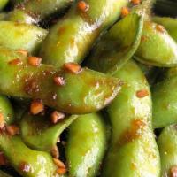 Garlic Edamame · Sauteed soy beans in pod, garlic butter and black pepper.