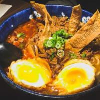 Kaiju Kobe Ramen · Medium garlic spicy. Monster in a bowl. House favorite spicy kobe beef ramen, sweet onion sa...