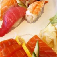 Sushi & Sashimi Combo · Six pieces choice of salmon, tuna or hamachi, and five pieces of nigiri combination.