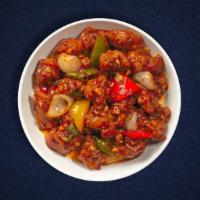 Classic Chili Chicken  · Chicken thigh meat cooked in soy sauce using corn flavor, tomatoes, chilies and garlic