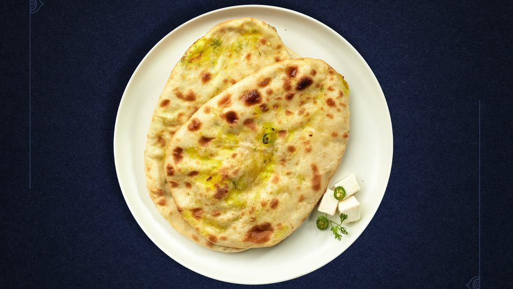 Paneer Naan · Freshly baked bread stuffed with cottage cheese cooked in a clay oven