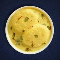 Rasmalai Rescue · Soft cottage cheese balls served in chilled creamy milk
