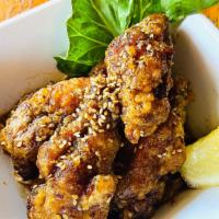 Nagoya Teba Chicken Wings · fried chicken wings marinated with sweet-peppered sauce, sesame seeds on top