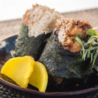 Onigiri (2) · rice balls, pressed rice & filling wrapped in nori seaweed, sesame seeds on top