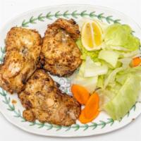 Tandoori Chicken Leg (4Pcs Cut From 2 Legs) · Chicken marinated in yogurt; herbs & spices baked in tandoor.