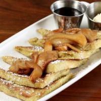 French Toast Special · Three  French toast, fried cinnamon apples, two eggs, choice of one hot link, two bacon stri...