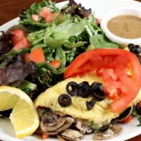 Veggie Omelette · Kale, spinach, mushrooms, tomatoes, onions, bells, black olives, avocado and Jack.