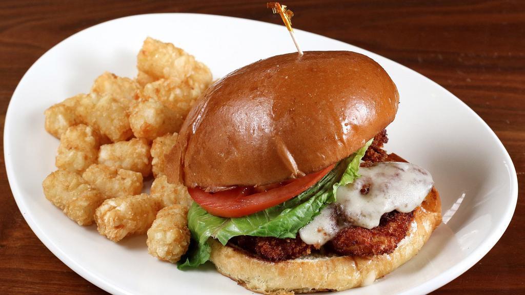 Buttermilk Fried Chicken · Lettuce, tomatoes, Swiss, and mayo.