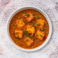 Mutter Paneer · Green peas cooked with cheese in creamy tomato sauce.