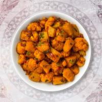 Aloo Ghobi · Cauliflower and potatoes cooked with spices and herbs.