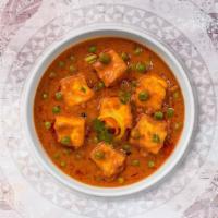 Matar Paneer · Cubes of fresh cottage cheese and green peas cooked in a creamy tomato gravy.