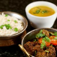 Goat Curry · Bone in goat meat cooked in authentic nepali style in house special sauce, herbs and spice.