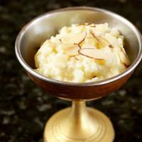 Kheer · Traditional rice pudding - a sweet delight.