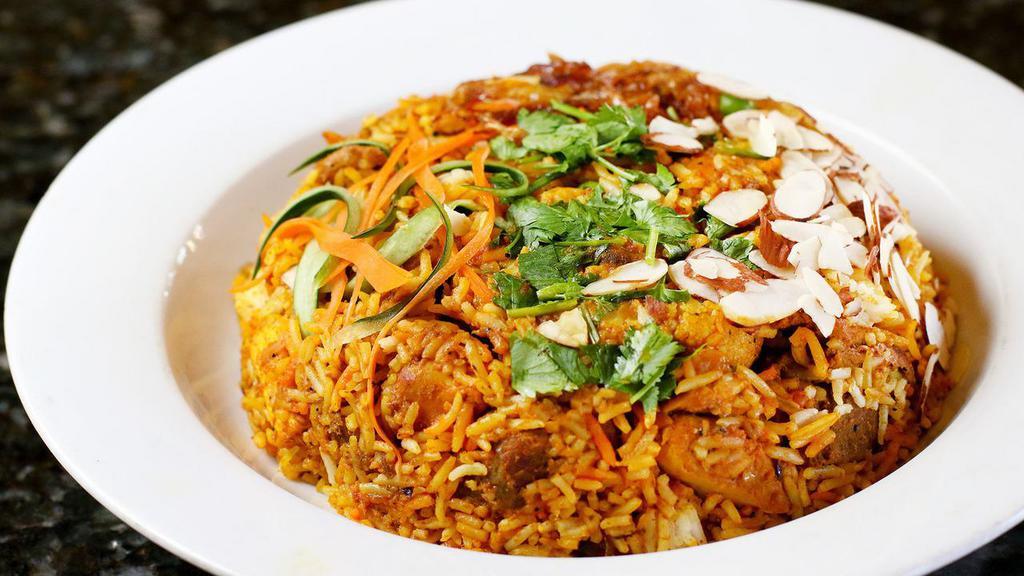 Veg. Biryani · Fresh Seasonal Mixed  vegetable cooked with basmati rice, mix of special herb and spices.