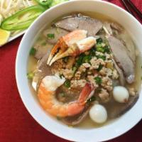 H3. Hủ Tiếu Nam Vang (Nước) · Rice noodle soup with tripe.