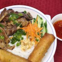 B6. Bun thit nuong, cha gio · Vermicelli with grilled pork and eggrolls.