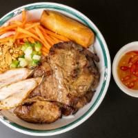 B8. Bun thit nuong, tom nuong, cha gio · Vermicelli with grilled pork, shrimp and egg roll.