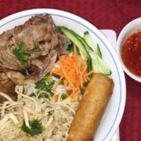 B7. Bun thit nuong,bi, cha gio · Vermicelli with grilled pork, shredded pork skin and egg roll.