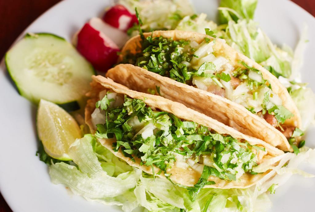 Regular Crispy Taco · Choice of meat, onion, cilantro and sauce / carne, cebolla, cilantro y salsa.