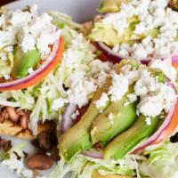 Sopes · Choice of meat, beans, cheese lettuce, sour cream, avocado and sauce / carne, frijoles, ques...