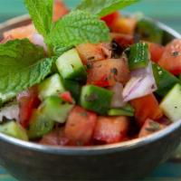 Shirazi Sala · Cucumber, Tomato, Red onions and house dressing ( olive oil, lime juice and house Spices)