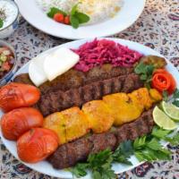 Torgabeh Special plate for two  · Two skewers of ground beef.
One Skewer of Chicken Cubes,
One skewer of beef Filet magnon
wit...